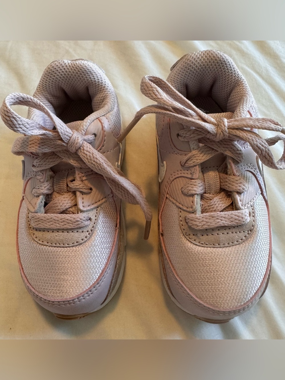 Nike Kids Light Pink Sneakers with Subtle White Swoosh